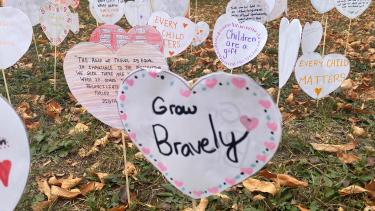 an image of paper hearts with words on them