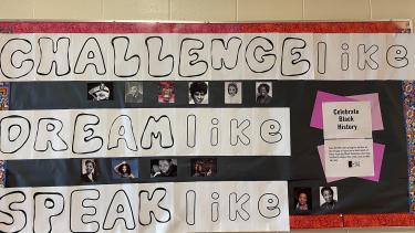 Black history poster on school wall