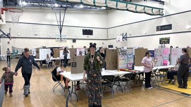 Science fair in a school gymnasium