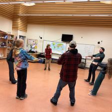 Students and parents in an activity room